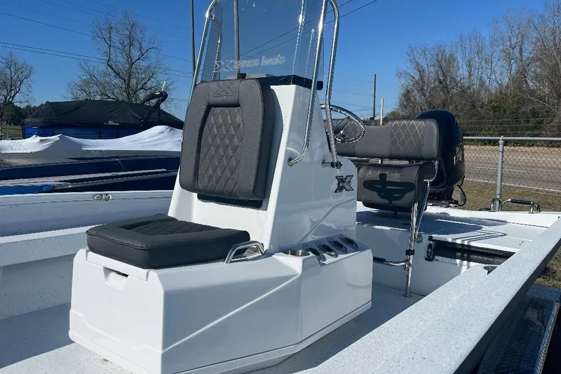 Slide: The Image of 2026 Xpress H22B Bay boat with sleek seating and modern design. - 9