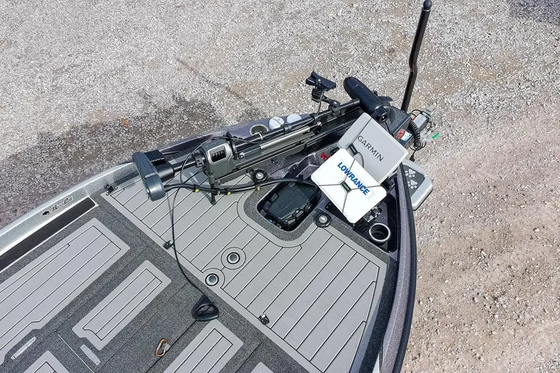 Slide: The Image of 2023 Bass Cat Puma STS boat deck with Garmin and Lowrance equipment. - 6