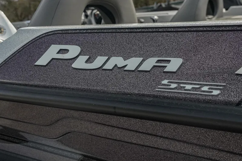 Slide: The Image of 2023 Bass Cat Puma STS boat logo in close-up view. - 9
