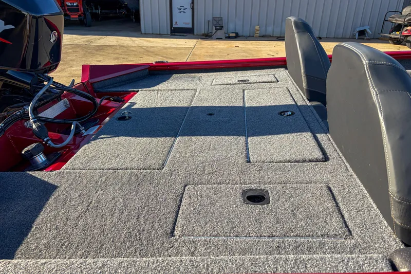 Slide: The Image of 2024 Tracker Pro Team 175 TXW Tournament Edition boat interior with carpeted deck and seating. - 5