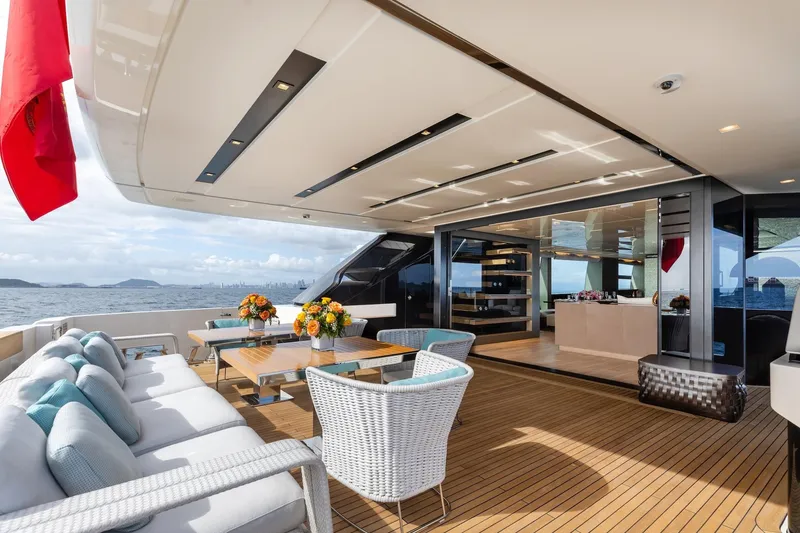 Slide: The Image of Luxurious 2020 Sanlorenzo SLA120A yacht deck with elegant seating and ocean view. - 10