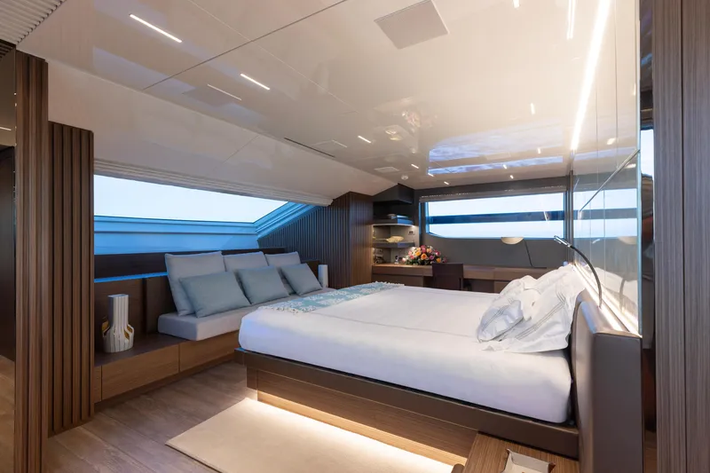 Slide: The Image of Luxurious Sanlorenzo SL120A 2022 yacht bedroom with modern design and elegant furnishings. - 22