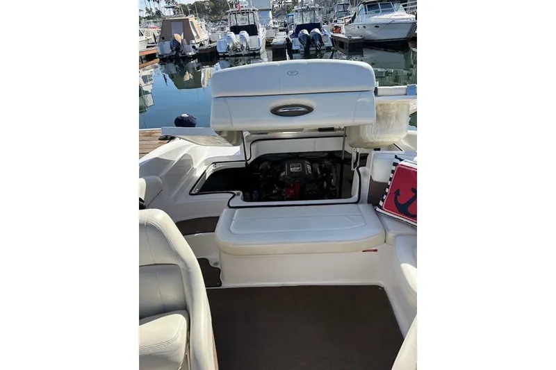 Slide: The Image of 2008 Cobalt 212 boat engine compartment open at marina. - 16