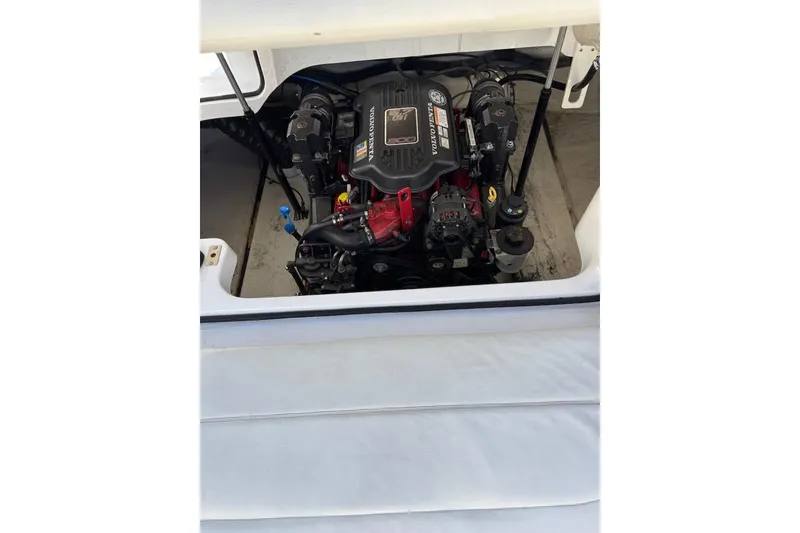 Slide: The Image of Engine compartment of a 2008 Cobalt 212 boat, featuring a Volvo Penta engine. - 18
