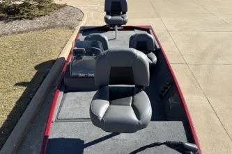 Slide: The Image of 2024 Tracker Bass Tracker Classic XL boat with gray seating and spacious deck. - 3