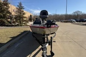 Slide: The Image of 2024 Tracker Bass Tracker Classic XL boat on trailer in parking lot. - 4