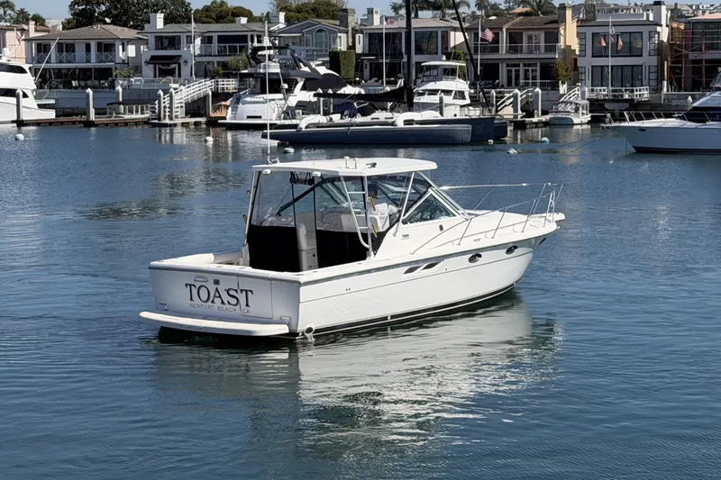 Slide: The Image of 2003 Tiara 3100 Open boat named "Toast" in Newport Beach marina. - 20