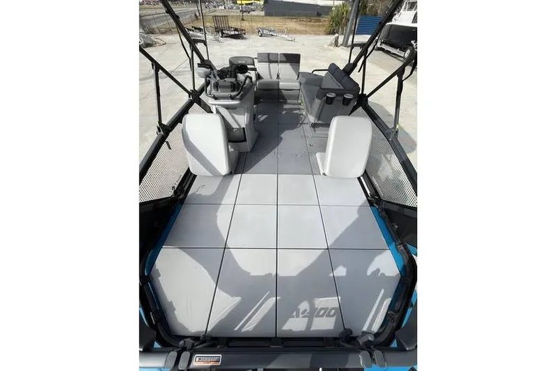 Slide: The Image of 2022 Sea Doo Switch 18 deck with modular seating and steering console. - 14