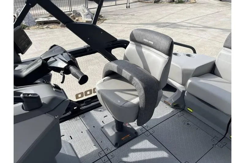Slide: The Image of 2022 Sea Doo Switch 18 interior with steering console and seating. - 20