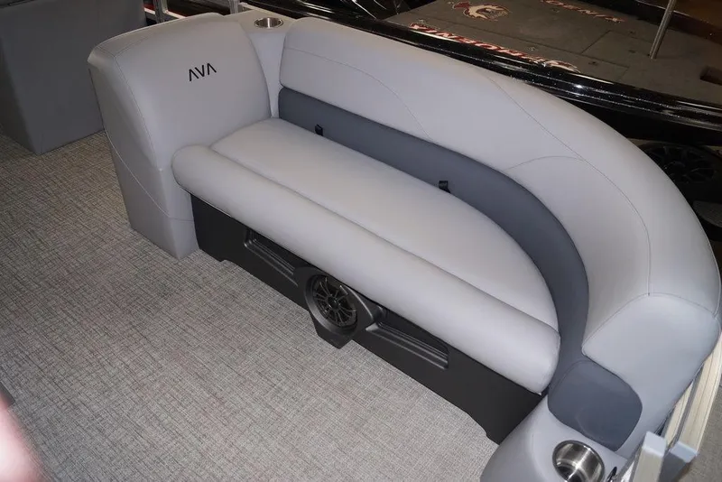 Slide: The Image of 2026 Avalon VLS Quad Lounge interior with gray seating and integrated speaker system. - 10