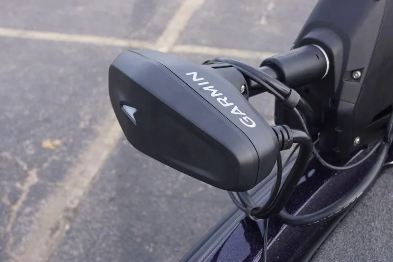 Slide: The Image of Garmin device mounted on a 2026 Phoenix 21 XE boat, close-up view. - 22