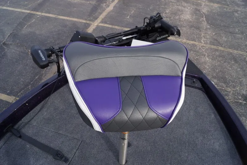 Slide: The Image of Purple and gray seat on 2026 Phoenix 21 XE boat, featuring Garmin equipment. - 23