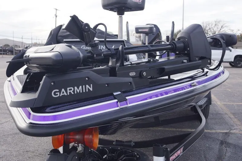 Slide: The Image of 2026 Phoenix 21 XE boat with Garmin equipment, featuring sleek design and advanced technology. - 26