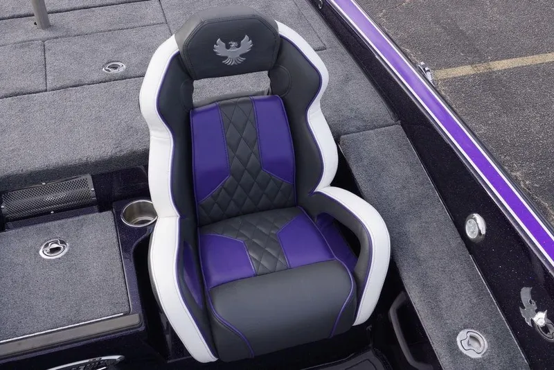 Slide: The Image of Luxurious Phoenix 21 XE 2026 boat seat with purple and black design, featuring a cup holder. - 28