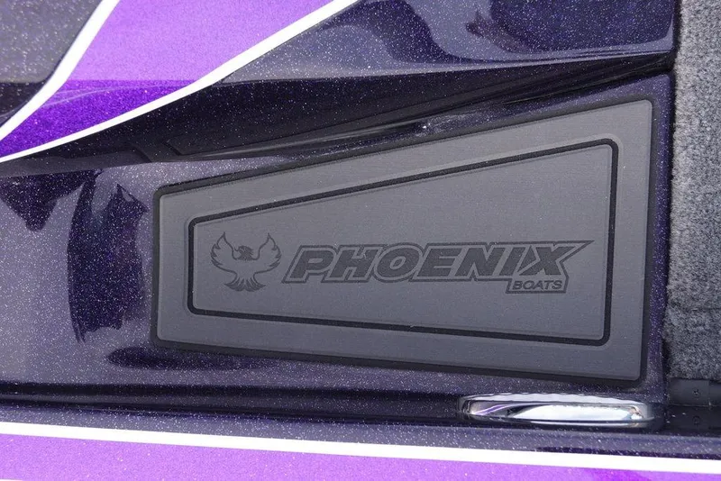 Slide: The Image of Phoenix 21 XE 2026 boat logo on sleek purple surface. - 29