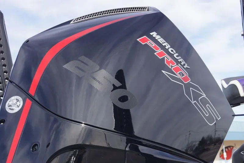 Slide: The Image of Outboard motor with Mercury Pro XS branding on a 2026 Phoenix 21 XE boat. - 4