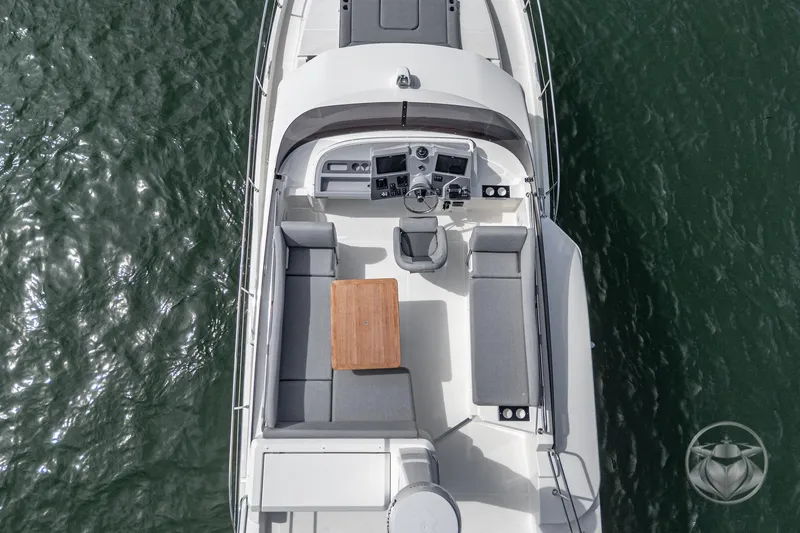 Slide: The Image of 2026 Beneteau Swift Trawler 41 Fly, aerial view of flybridge and seating area. - 27