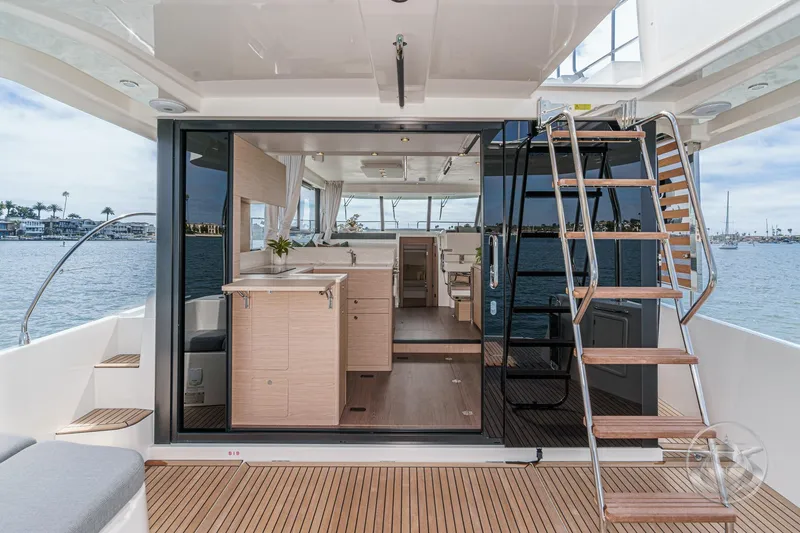 Slide: The Image of 2026 Beneteau Swift Trawler 41 Fly interior with modern design and wooden accents. - 39