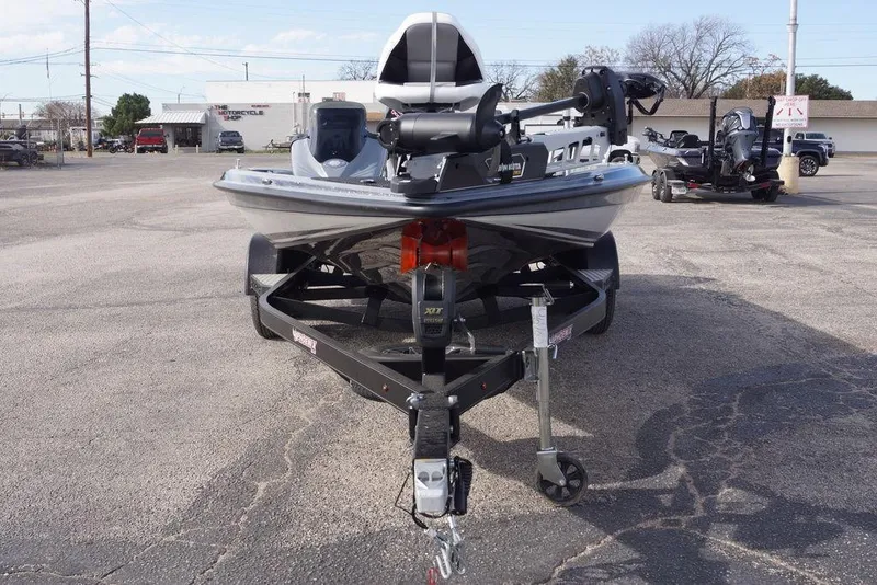 Slide: The Image of 2026 Phoenix 819 ZXL boat on trailer in parking lot, front view. - 4