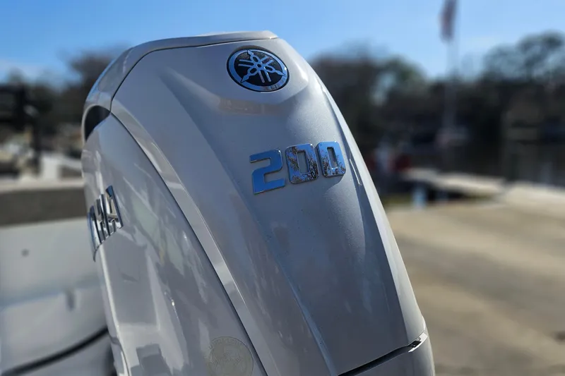 Slide: The Image of Yamaha 200 outboard motor on 2026 Sea Hunt Ultra 229 boat, close-up view. - 2