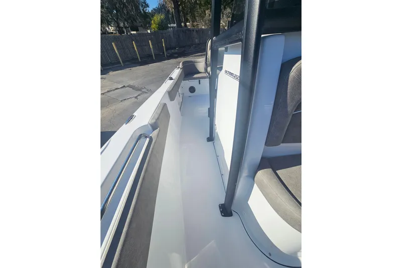 Slide: The Image of 2026 Sea Hunt Ultra 229 boat interior with sleek seating and modern design. - 26