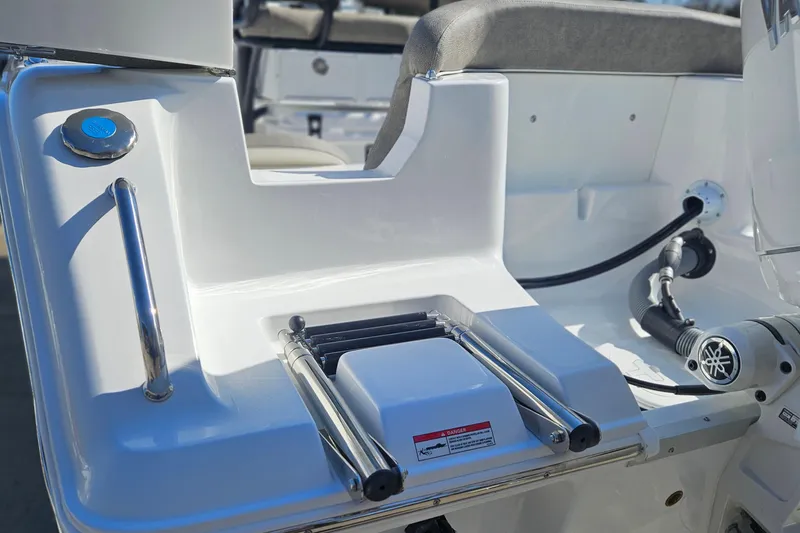 Slide: The Image of 2026 Sea Hunt Ultra 229 boat ladder and deck details. - 3