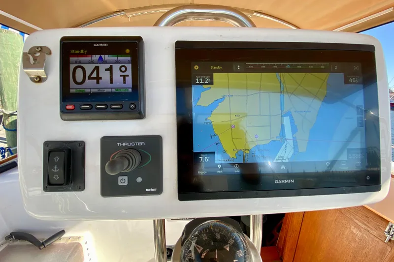 Slide: The Image of Boat navigation system with Garmin displays on a 1980 Wellington 44 yacht. - 19