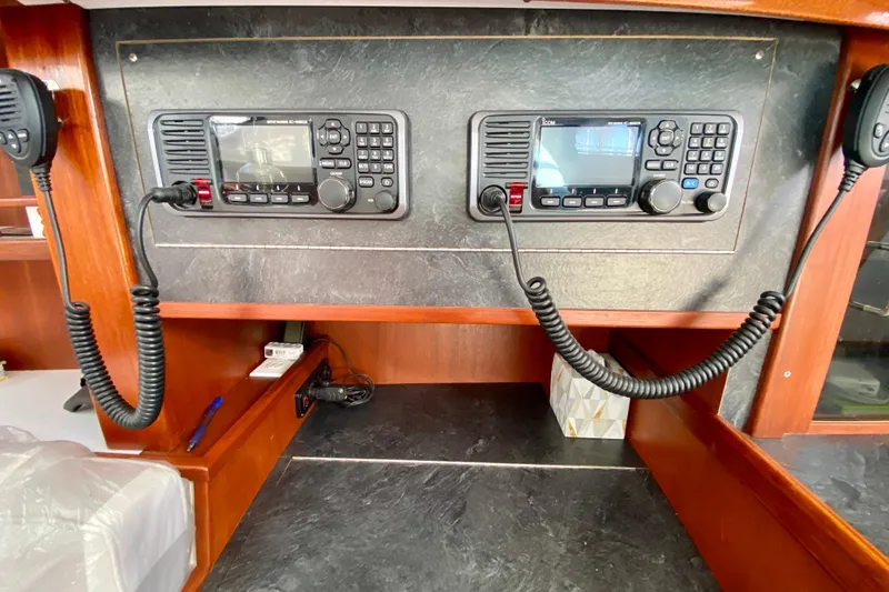 Slide: The Image of Radio equipment on a 1980 Wellington 44 boat, featuring dual communication systems. - 27