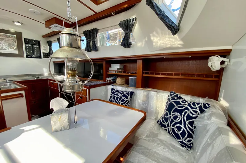 Slide: The Image of Interior of 1980 Wellington 44 yacht with nautical decor and vintage lantern. - 36