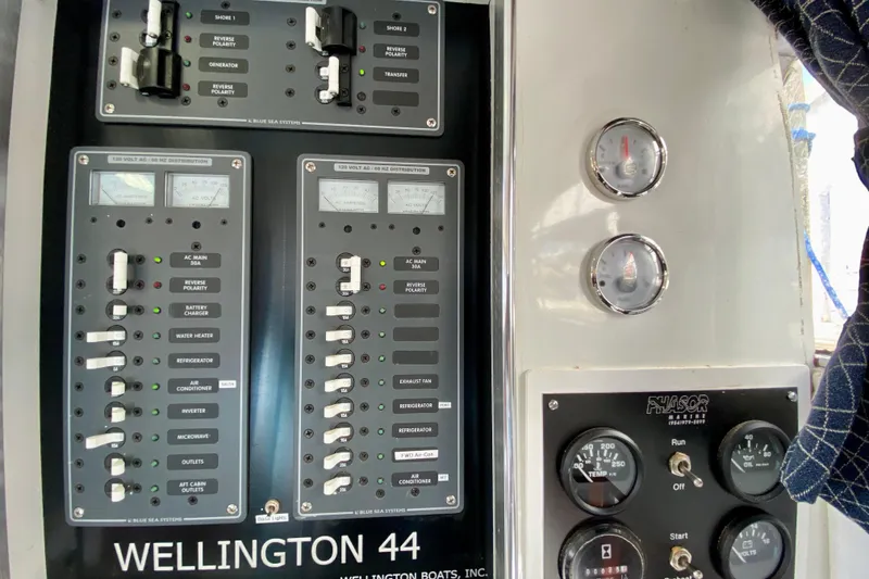 Slide: The Image of Electrical panel of 1980 Wellington 44 boat with gauges and switches. - 39