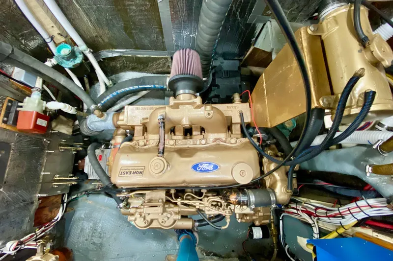 Slide: The Image of Engine room of a 1980 Wellington 44, featuring a Ford diesel engine. - 45