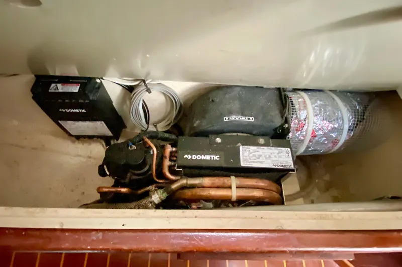 Slide: The Image of Dometic air conditioning unit in a 1980 Wellington 44 yacht interior. - 55