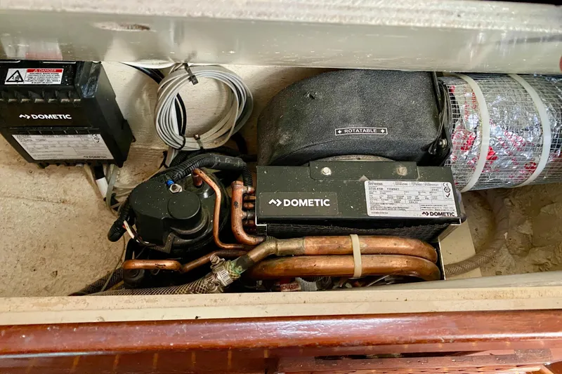 Slide: The Image of Dometic air conditioning unit in a 1980 Wellington 44 boat. - 56