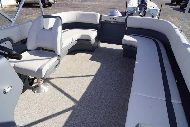 Slide: The Image of 2026 Avalon GS Quad Lounge 18' pontoon boat interior with spacious seating and modern design. - 13