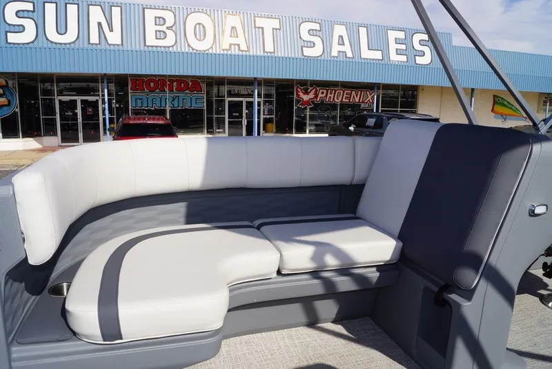 Slide: The Image of 2026 Avalon GS Quad Lounge boat interior at Sun Boat Sales dealership. - 14