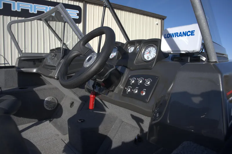 Slide: The Image of 2020 Tracker Pro Guide V-175 Combo boat dashboard with steering wheel and Lowrance electronics. - 3
