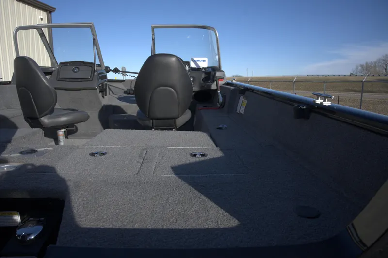 Slide: The Image of 2020 Tracker Pro Guide V-175 Combo boat interior with seating and steering console. - 5