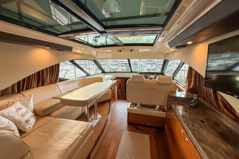Slide: The Image of Luxurious interior of 2016 Sea Ray Sundancer 510 yacht with plush seating and modern amenities. - 12