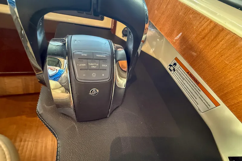 Slide: The Image of Control panel of a 2016 Sea Ray Sundancer 510 yacht, featuring various operational buttons. - 16