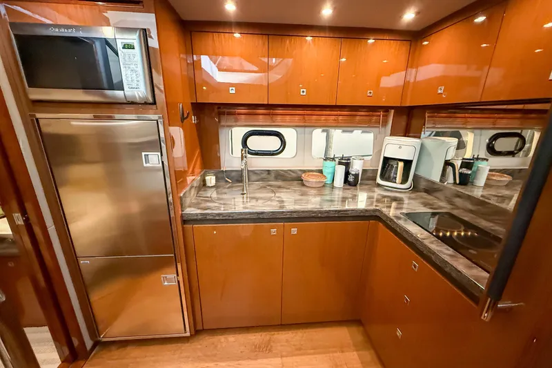 Slide: The Image of Luxurious kitchen interior of 2016 Sea Ray Sundancer 510 yacht with modern appliances. - 19