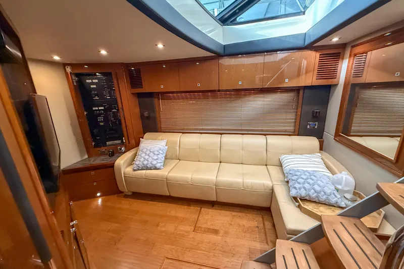 Slide: The Image of Luxurious interior of 2016 Sea Ray Sundancer 510 yacht with beige leather seating. - 23