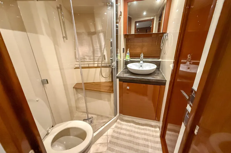 Slide: The Image of Luxurious bathroom in 2016 Sea Ray Sundancer 510 yacht with modern fixtures and shower. - 25