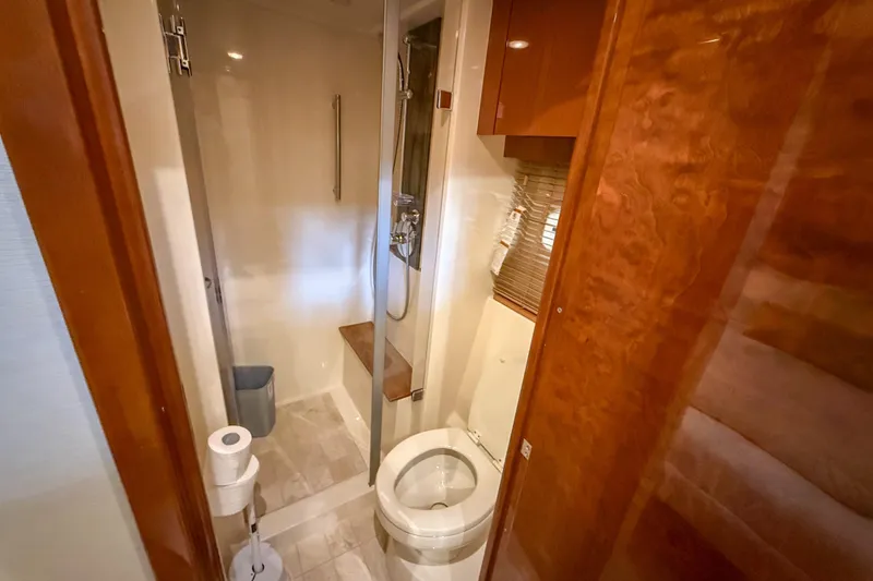 Slide: The Image of Luxurious bathroom in 2016 Sea Ray Sundancer 510 yacht with shower and toilet. - 27