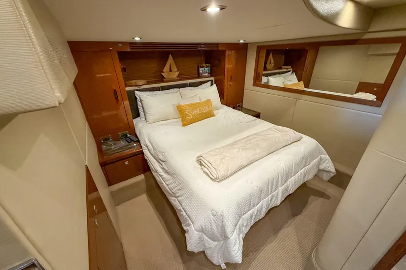 Slide: The Image of Luxurious cabin interior of 2016 Sea Ray Sundancer 510 yacht with cozy bedding. - 29