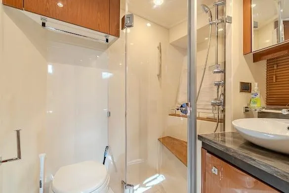 Slide: The Image of Luxurious bathroom in 2016 Sea Ray Sundancer 510 yacht with modern fixtures and glass shower. - 37