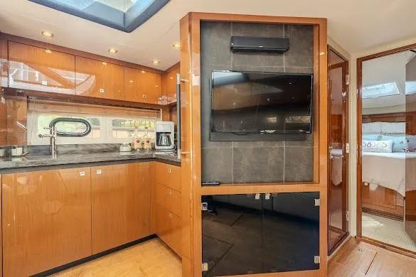 Slide: The Image of Luxurious 2016 Sea Ray Sundancer 510 yacht interior with modern kitchen and entertainment area. - 41