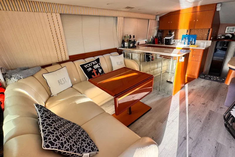 Slide: The Image of Luxurious interior of 1999 Ocean Yachts 48 Super Sport with elegant seating and modern amenities. - 8