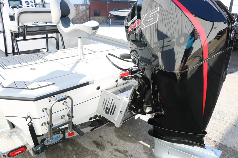 Slide: The Image of 2025 Vexus ACX 2210 boat with powerful Pro XS 250 engine, featuring sleek design and modern seating. - 12