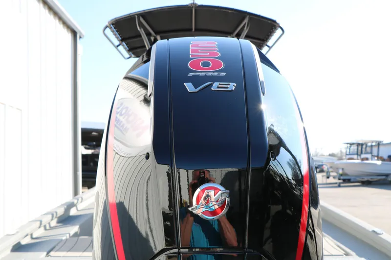 Slide: The Image of 2025 Vexus ACX 2210 boat engine, featuring a powerful 250 Pro V8 motor. - 13