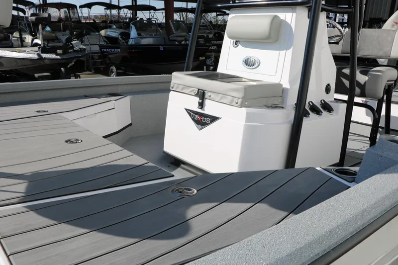 Slide: The Image of 2025 Vexus ACX 2210 boat interior with sleek seating and modern design. - 16